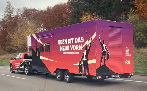 LIV Dachdecker: Dachdeckermobil Foto in Fahrt